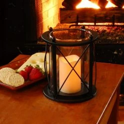 LUMABASE 7.5 in. x 8.25 in. Black Round CrissCross Metal Lantern with LED Candle -Cheap Garden Center Store blacks lumabase citronella candles torches 99101 4f 1000